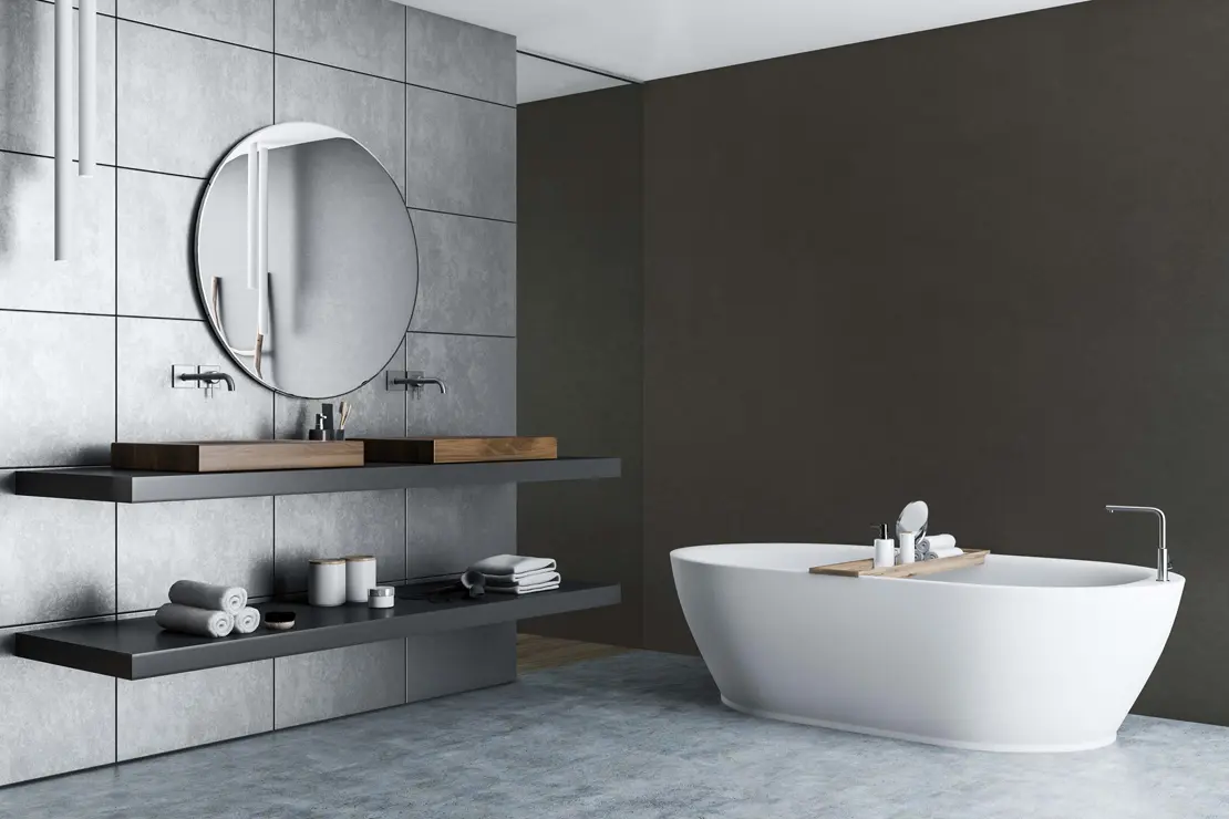 Baño con muros de microcemento de color gris profundo. Baño con muros de microcemento de color gris profundo.